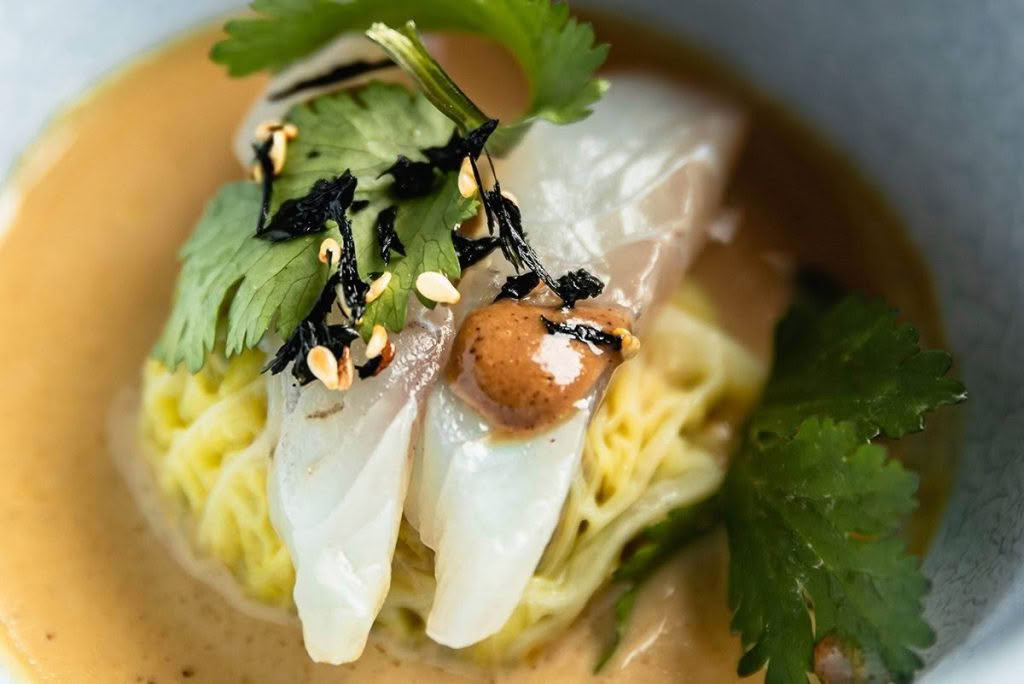 Cuisine-Good-Food-Guide-2024-The-Bistro-Pork-belly-dunpling-raw-blue-nose-fermented-black-bean-dressing.jpg