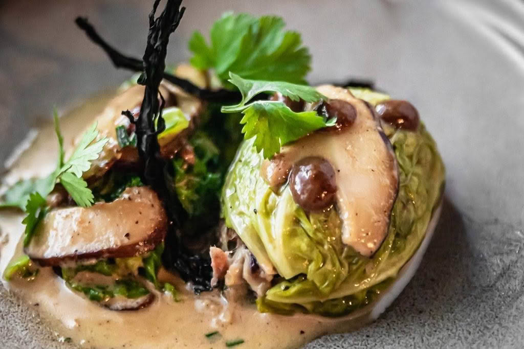 Cuisine-Good-Food-Guide-2024-The-Bistro-Porkbelly-shiitake-dumpling-fermented-black-bean-broth.jpg