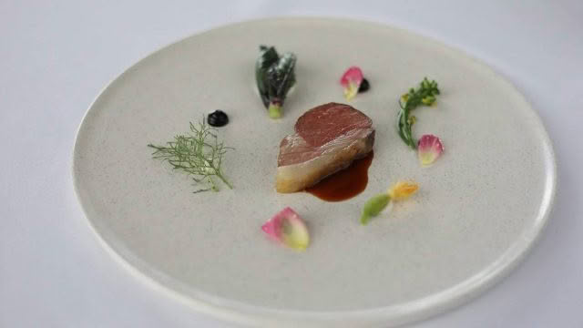Cuisine-Good-Food-Guide-2024-The-Chefs-Table-Orianna-Photography-Station-lamb-with-Spring-greens-and-pickled-rose.jpg